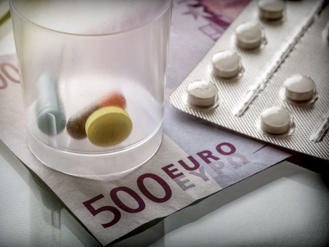 Some medicines along with a ticket of 500 euros, conceptual image copay health