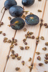 Grape seeds and sliced black grapes