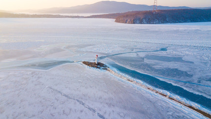 Aerial view of the Tokarevskiy lighthouse - one of the oldest lighthouses in the Far East, still an important navigational structure and popular attractions of Vladivostok city, Russia.