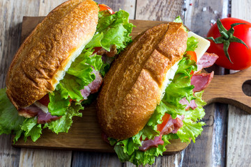 Two fresh submarine sandwiches