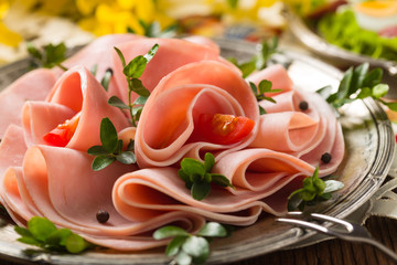 Sliced ham with decoration Easter. © gkrphoto