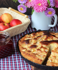 Apple pie and strawberry jam. Still life.