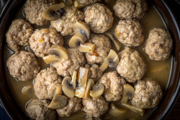 Delicious homemade swedish meatballs with mushroom cream sauce. Small depth of field.