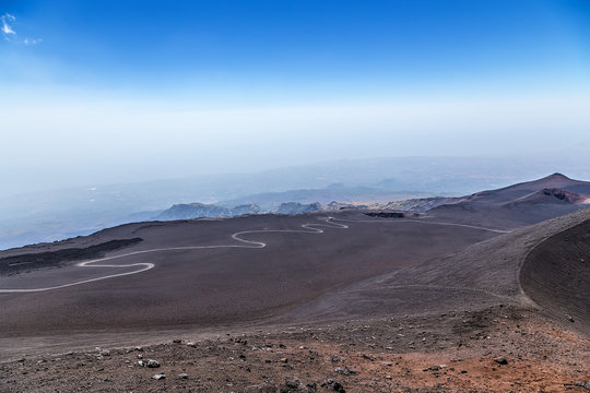 The volcano of Etna, Sicily, Italy. Road - serpentine, leading between the craters to the top of the volcano