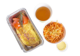 Ham omelet with carrot salad.