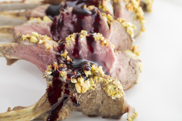 Roasted rack of lamb with pistachios.