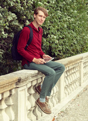 young man using tablet computer