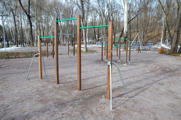 Fototapeta premium Playground with a bar in the city park