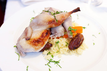 Quail with rice and vegetables