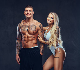 Beautiful couple, posing in studio.