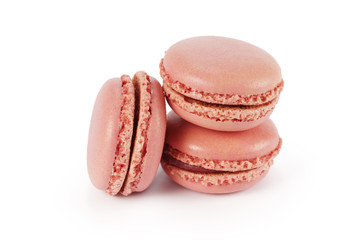 three pink macarons isolated on white