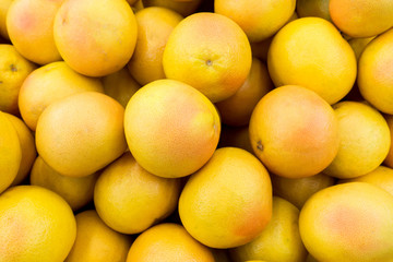 Grapefruit on the market counter top view