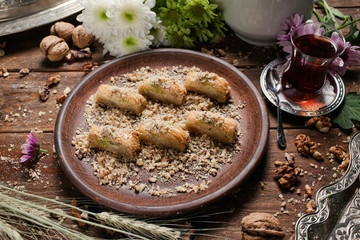 Baklava traditional oriental dessert. Tea and turkish pastry breakfast concept
