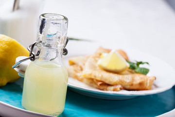 English-style pancakes with lemon and sugar