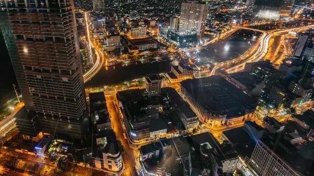 Night cityscape view of Ho Chi Minh City from the high of Bitexco tower.Traffic lighting trails on street