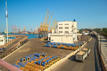 Cargo stock on sea port. Warehouse on sea port territory.