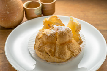 Japanese Crispy cream puff Dessert on White dish