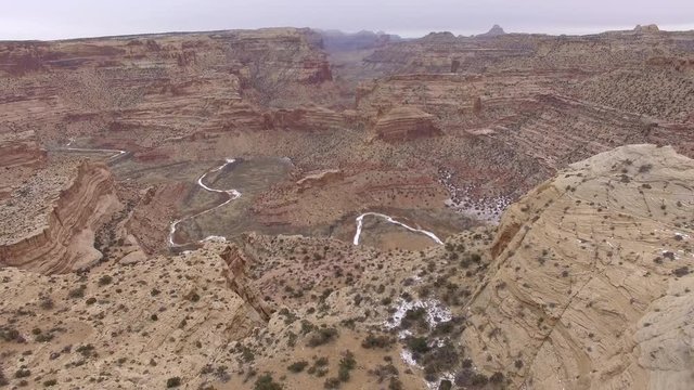 Aerial view of the Little Grand Canyon past legde of overlook at the Wedge in the San Rafael Swell.