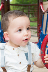 Active little boy on playground