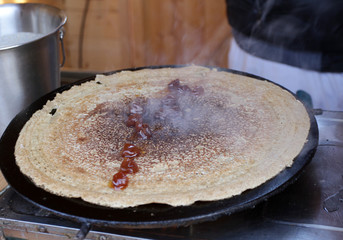 Pancakes - Palachinka, Palatschinke or palacsinta is a thin crepe - variety of pancake. Palatschinke are thin pancakes similar to the French crepes. Pictures through steam from pancakes.