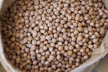 Organic chickpeas grains in a bag for storage on a farmers market