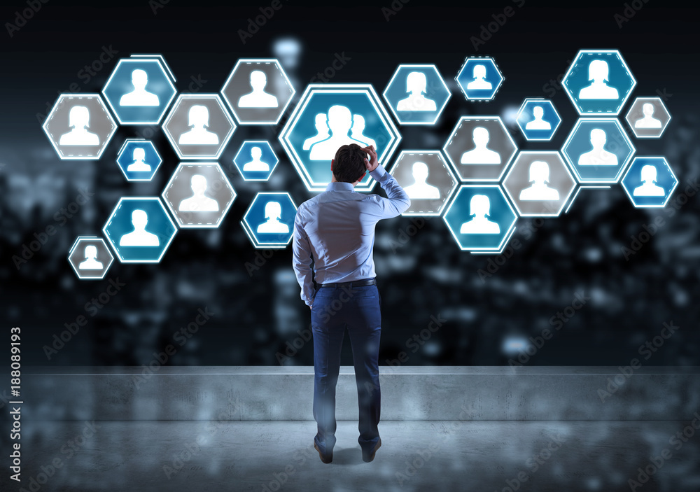 Aufkleber businessman watching social network interface on a rooftop 3d rendering