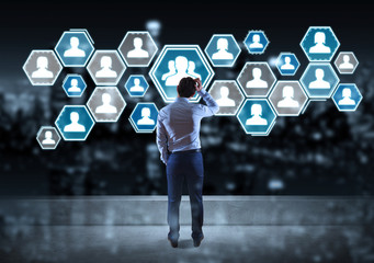 Businessman watching social network interface on a rooftop 3D rendering