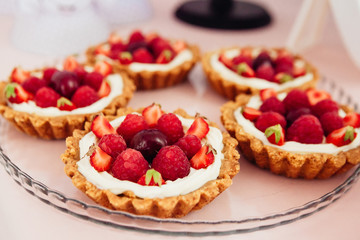 beautiful dessert with fruits of raspberries and strawberries