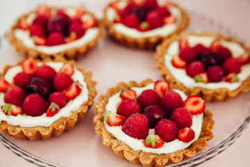 beautiful dessert with fruits of raspberries and strawberries