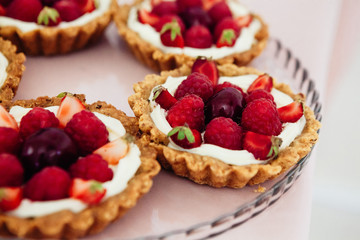 beautiful dessert with fruits of raspberries and strawberries