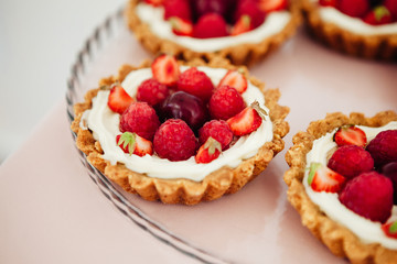 beautiful dessert with fruits of raspberries and strawberries