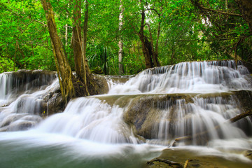 Fototapeta na wymiar Huay Mae khamin waterfall a beautiful haven of the middle of the forest in Kanchanaburi. Thailand