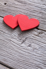Obraz premium Valentine background with handmade hearts on rustic wood