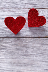 Valentine day background, handmade hearts on wood, copy space