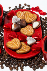 plate with cookies, candies and coffee for St. Valentine's Day, closeup