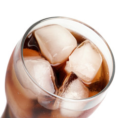 Fototapeta na wymiar Cold cola in glass on white background, closeup