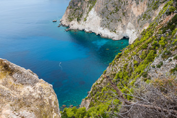 Fototapeta na wymiar Keri cape. Blue water and rocks of beach on Zakynthos island, Greece