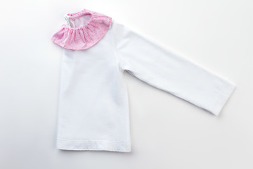 White and pink sleepwear jacket for a little girl. Soft lightweight cotton. Cute decorative collar.