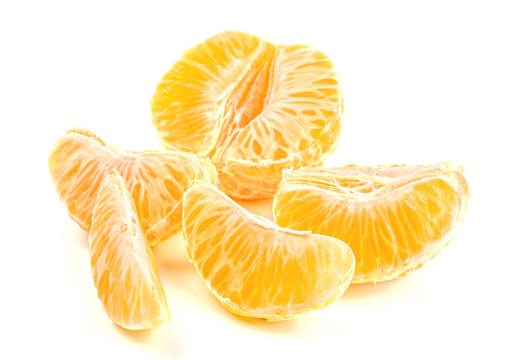 Peeled ripe mandarin isolated on white