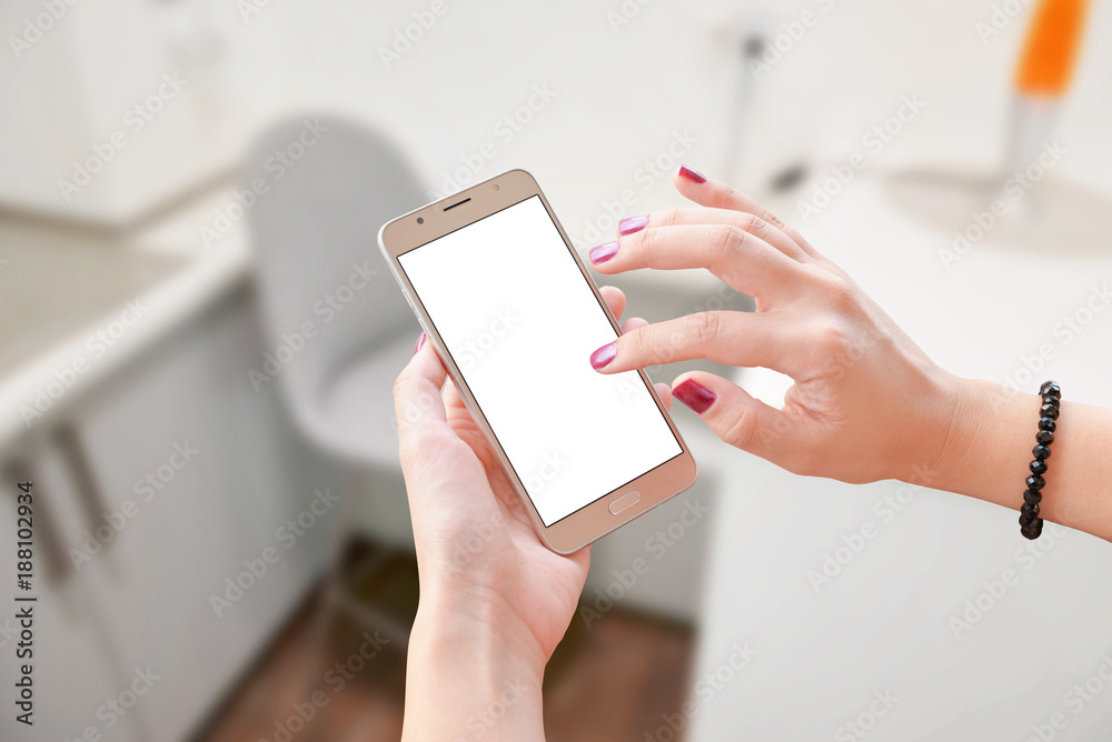 Aufkleber woman touch smart phone with blank isolated screen for app presentation. office in background.