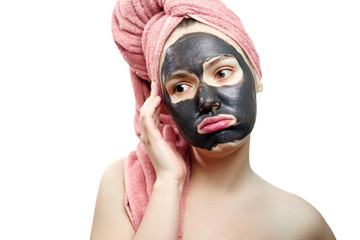 beautiful pretty sexy girl with black face mask on the white background,  close-up portrait, isolated, girl with a pink towel on her head, girl tired of waiting, black mask on girl's face,