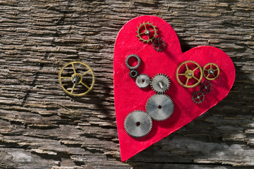 Gears on the background of the heart.