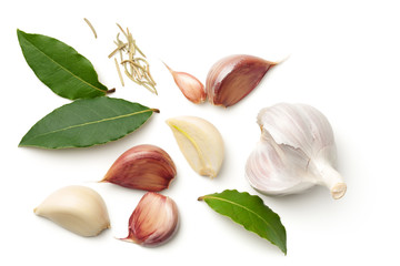 Garlic, Bay Leaves and Dried Rosemary Isolated on White Background