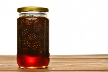 Bank of jam from pine cones