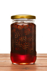 buds in a jar of honey