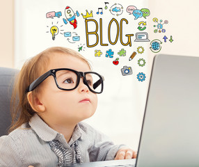 Blog text with toddler girl using her laptop