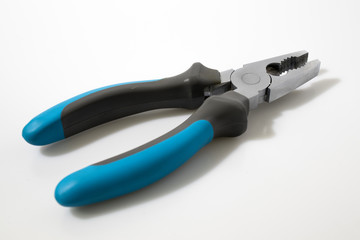 Blue flat-nose plier on a white background
