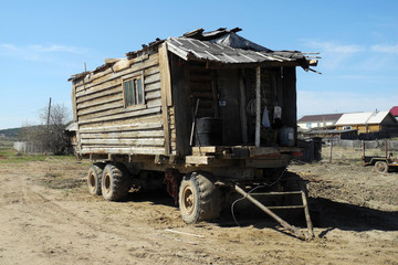 Parked wooden caravan