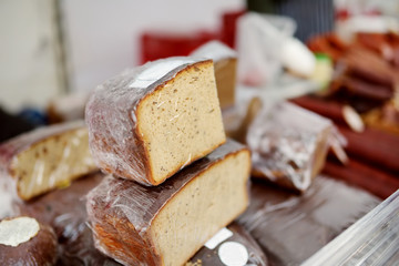 Loaves of organic bread for sale at outdoor farmers market in Vilnius