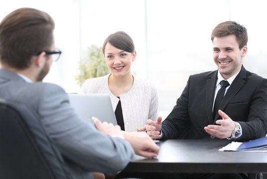 employees communicate with the customer in the office